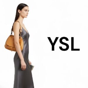 Authentic Yves Saint Laurent luxury designer vintage leather handbag purse